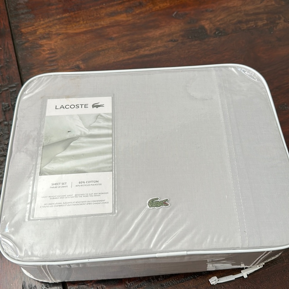 Lacoste Grey California king sheet set. Nib.